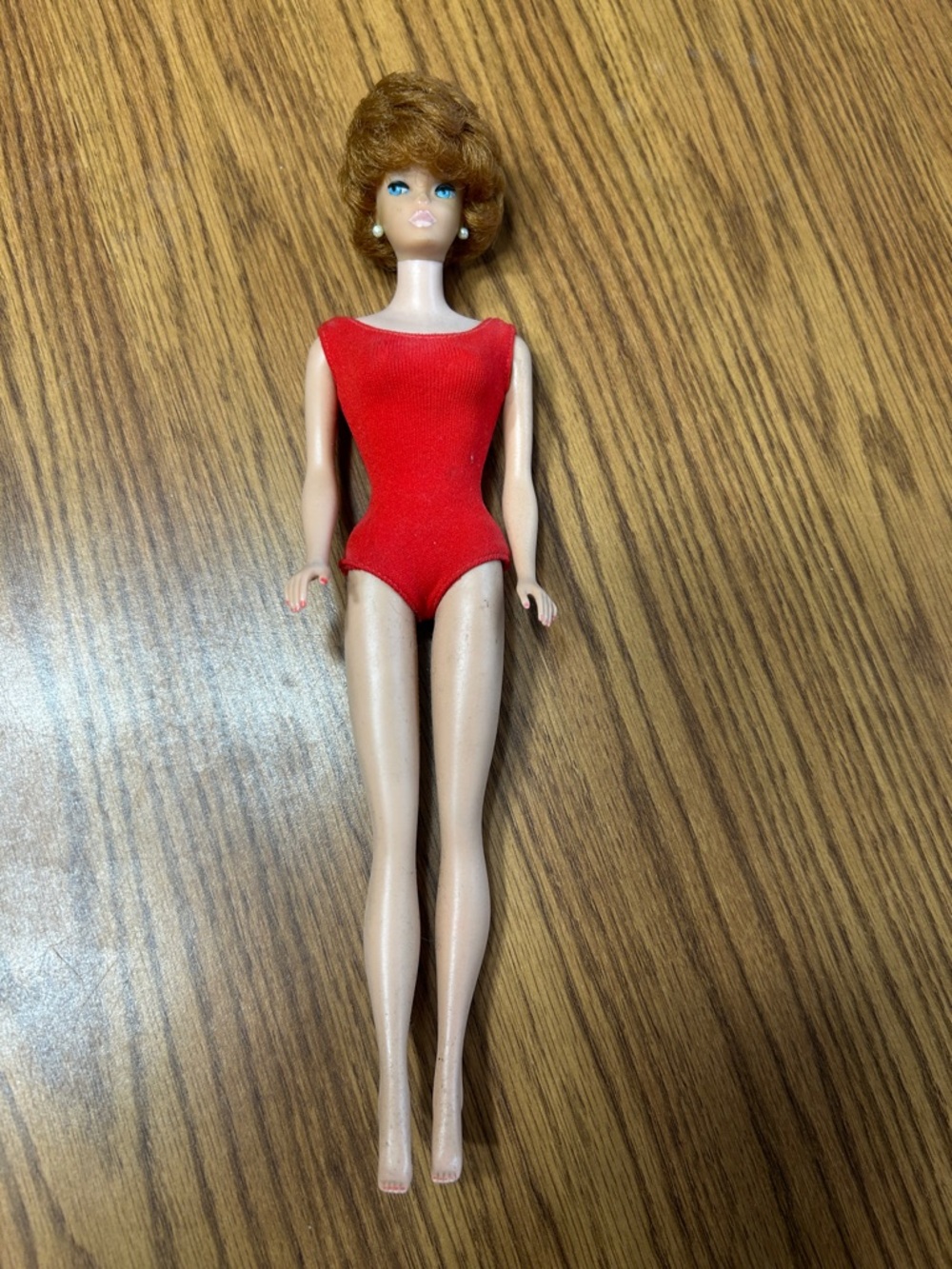 Vintage Barbie Doll in Red Swimsuit
1962